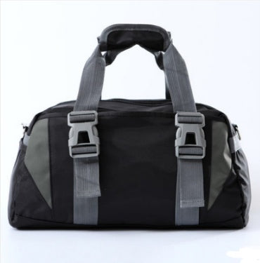 Yoga gym bag in black with gray striped straps and shoulder carry belt