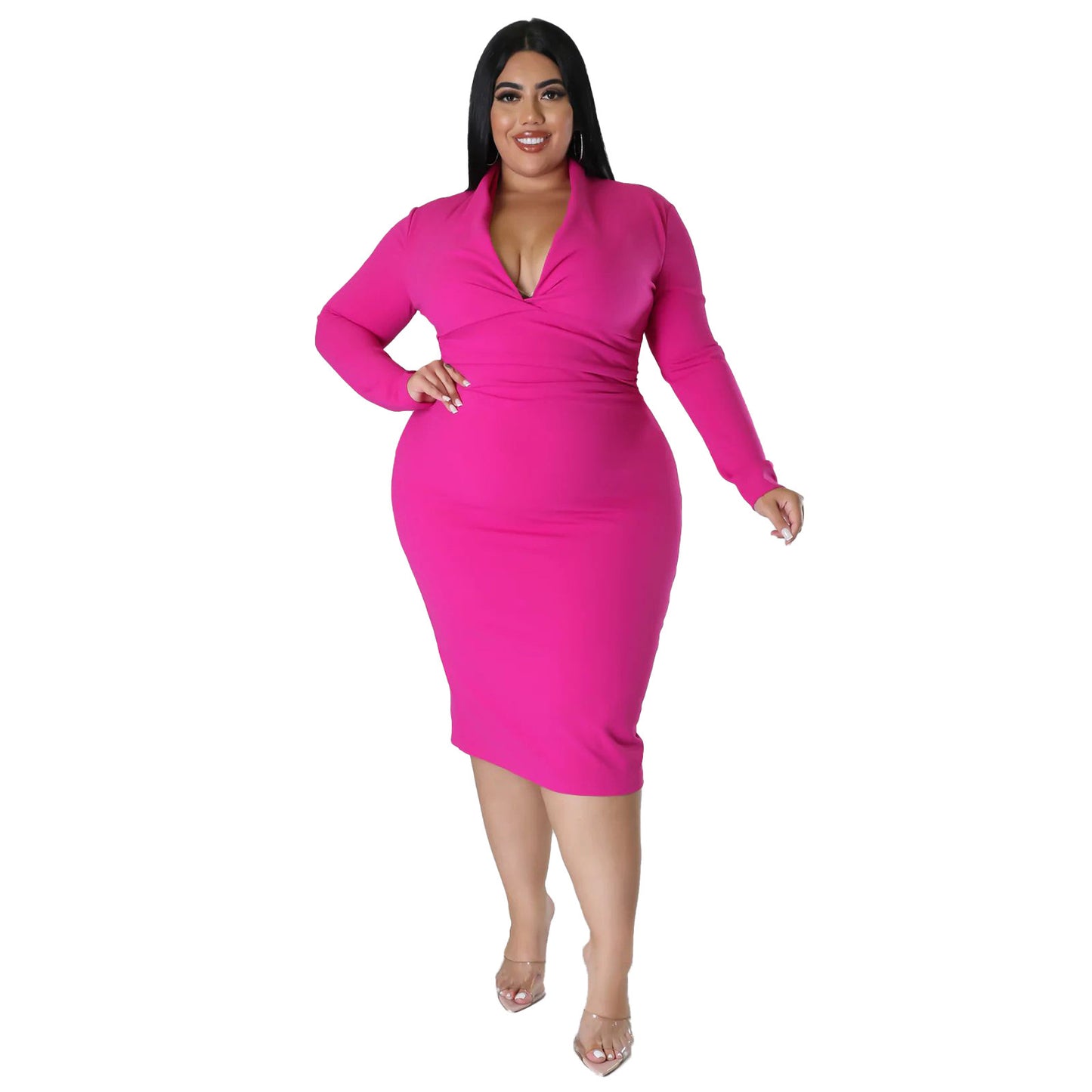 Woman wearing a bright pink dress on a white background