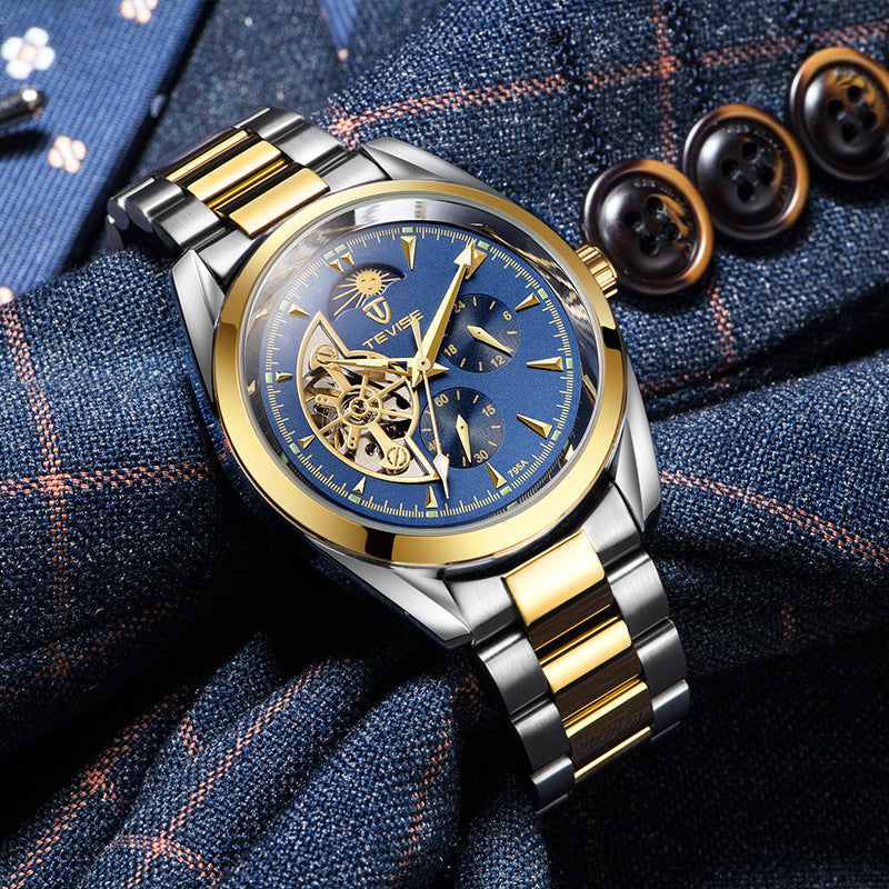 Two-tone mechanical tourbillon watch with blue dial and gold-accent metal link bracelet