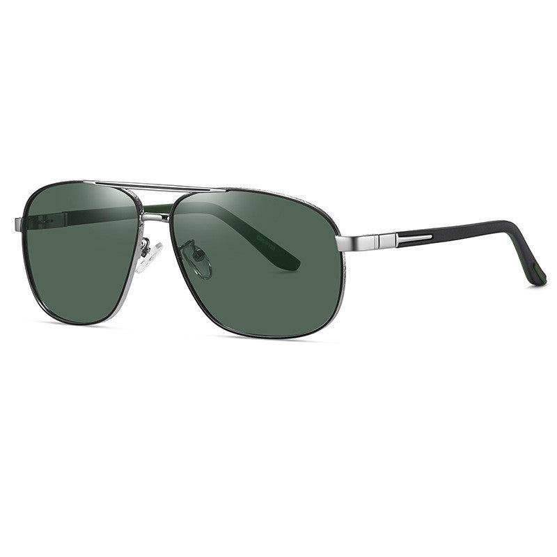 Men's Sunglasses with green lenses and silver frame on a white background