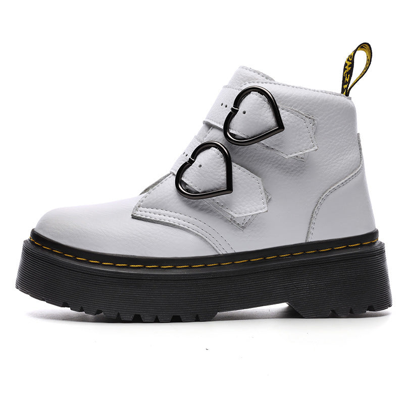 White boot with heart-shaped buckles on a white background