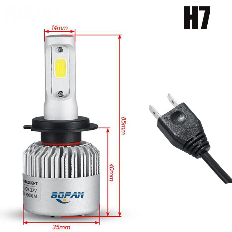 LED headlight bulb H7 with yellow LED, silver finned housing, and two-pin style cable plug