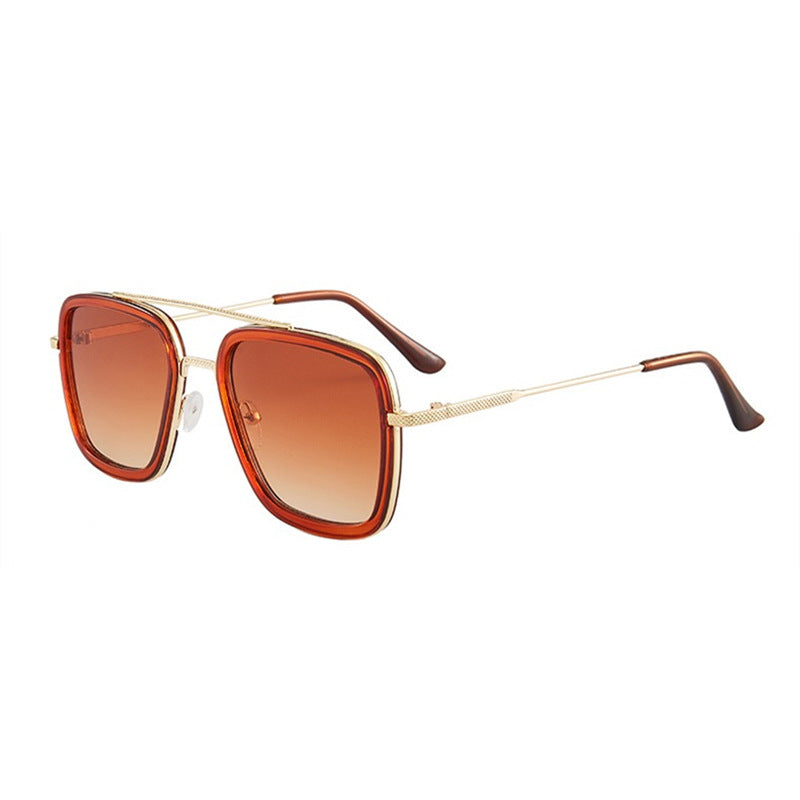 Square-frame sunglasses with amber lenses, gold metal frame, and brown temples