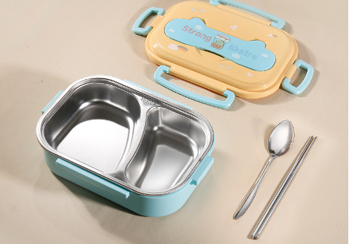 Blue lunch box with yellow lid, stainless steel two-compartment interior, spoon, and chopsticks