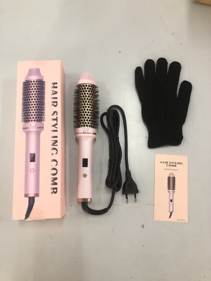 Hair styling comb with packaging, glove, and power cord on a white surface