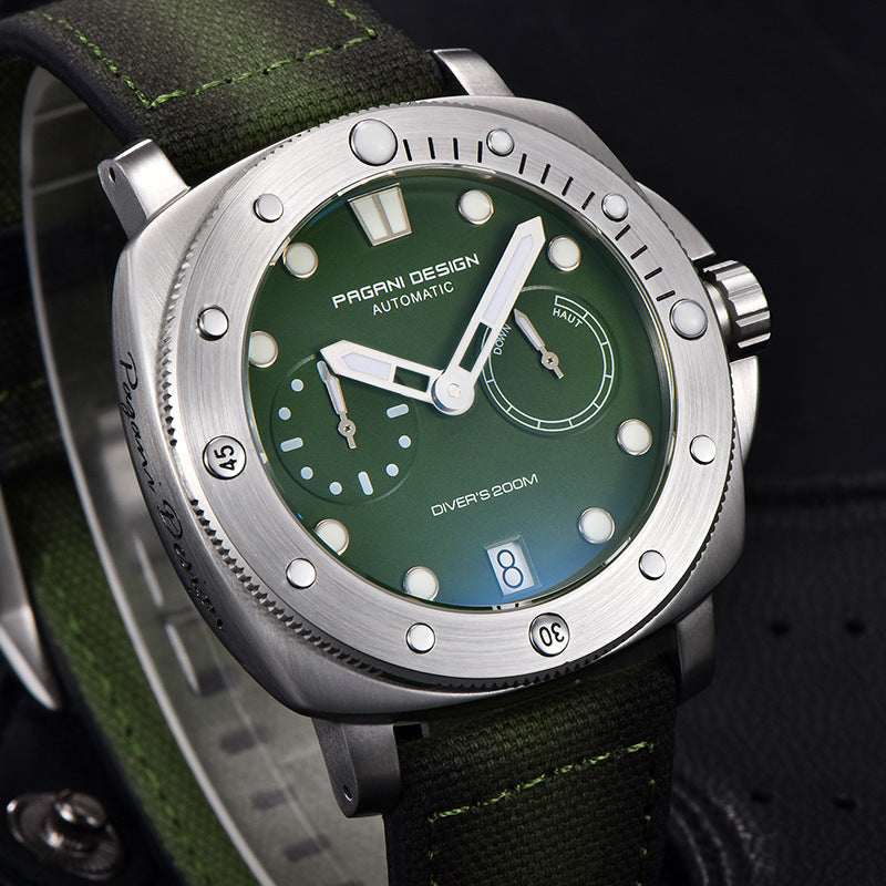 Green watch with silver case and green strap on a dark background