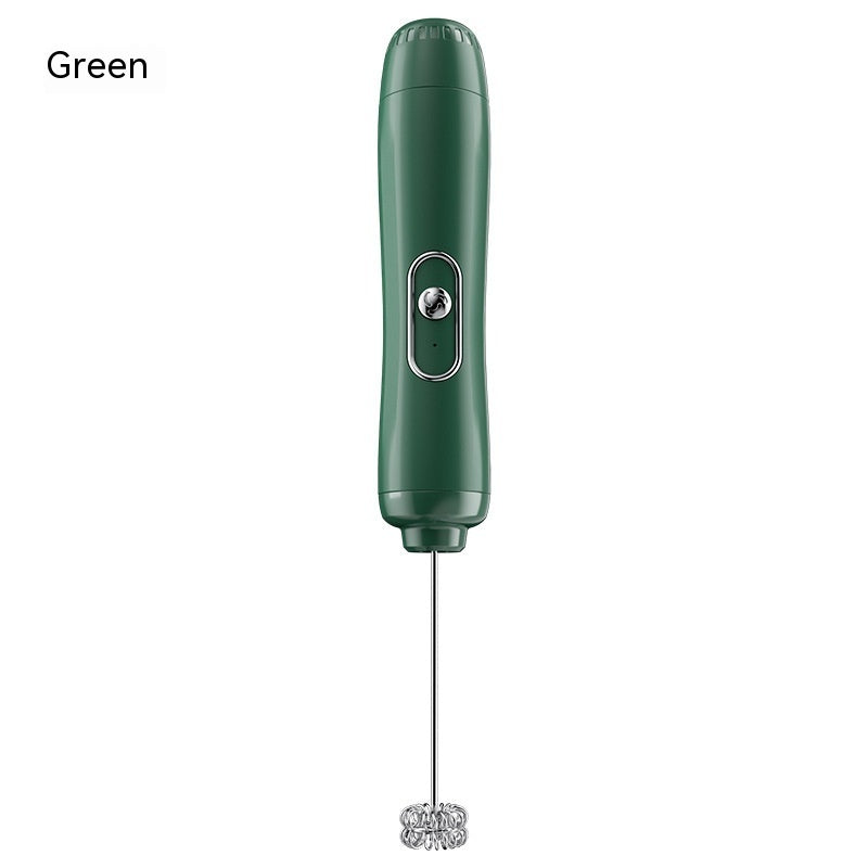 Green handheld milk frother on a white background