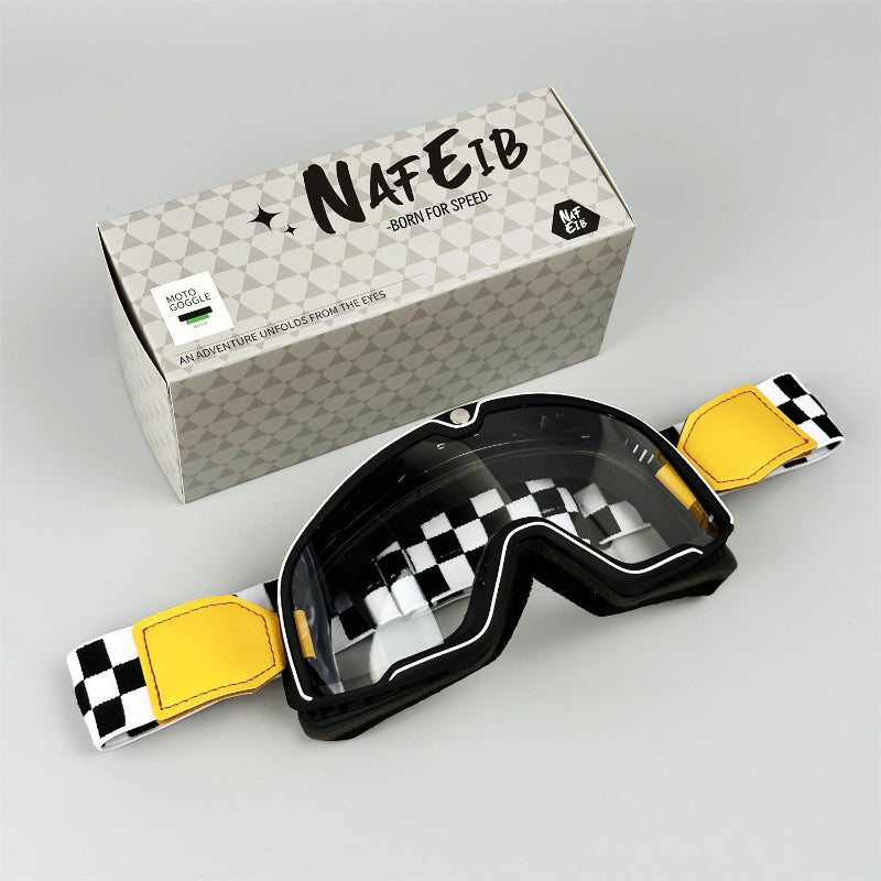 Motorcycle sport goggles with black frame, yellow pads, checkered lens insert