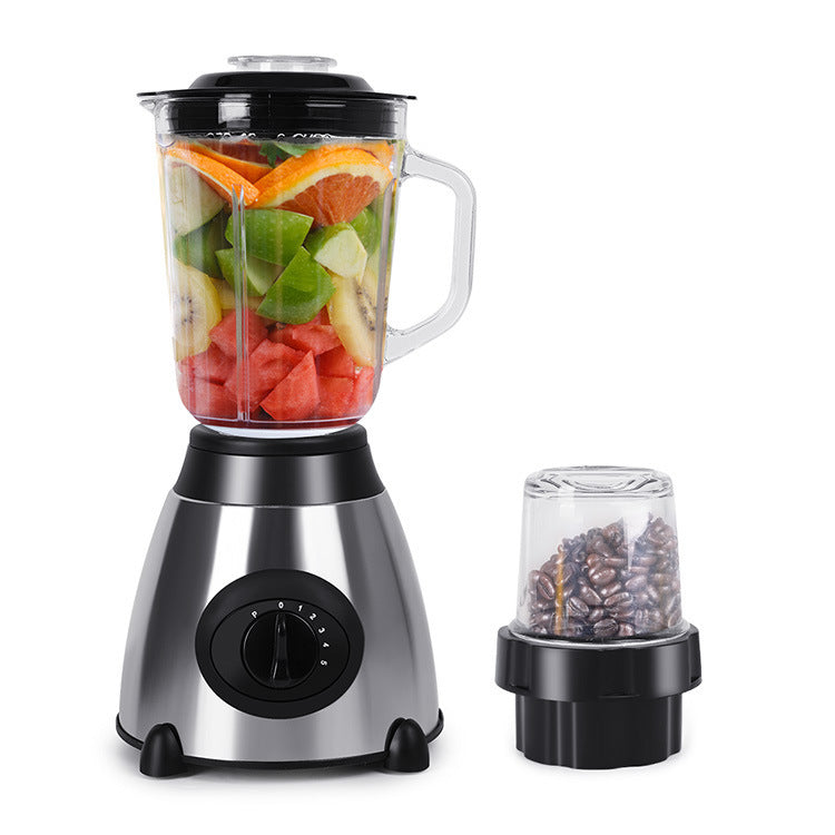 Blender with a container of fruits and a grinder attachment on a white background