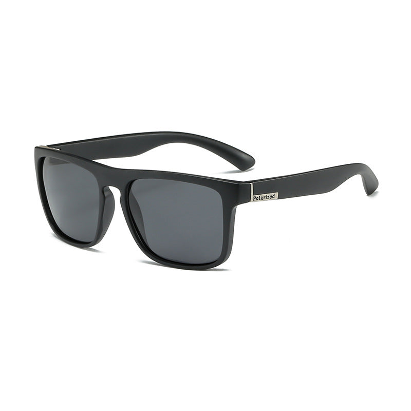 Black sunglasses with a green logo on a white background