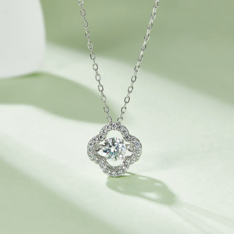 Silver four-leaf clover pendant necklace, round center stone with halo surround