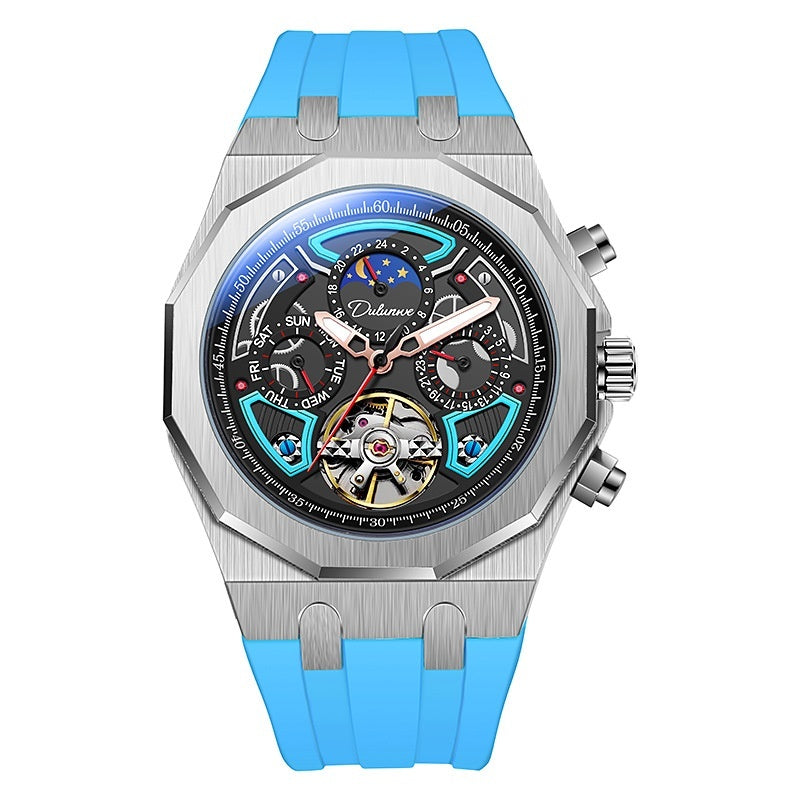 Watch with blue strap and detailed face on a white background