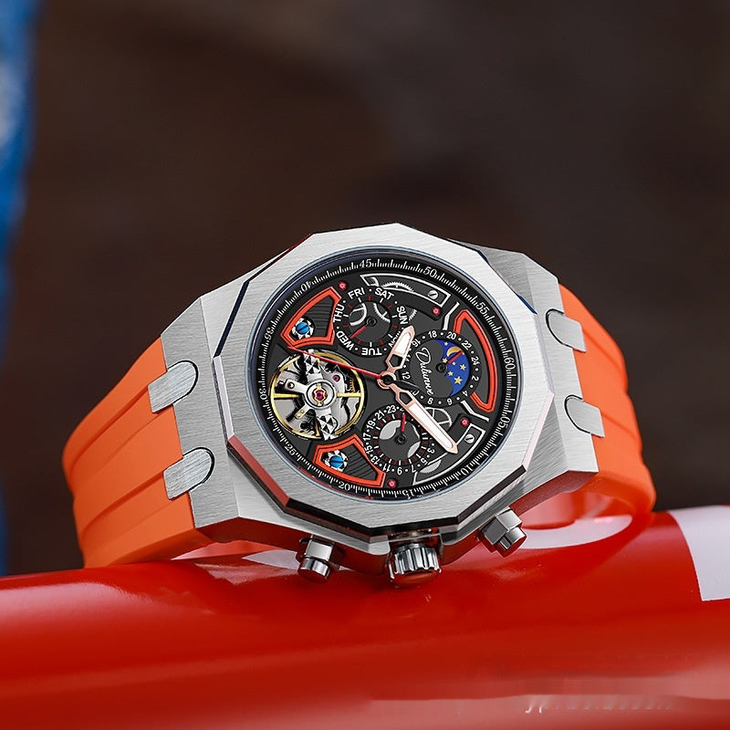 Watch with a red strap on a dark background