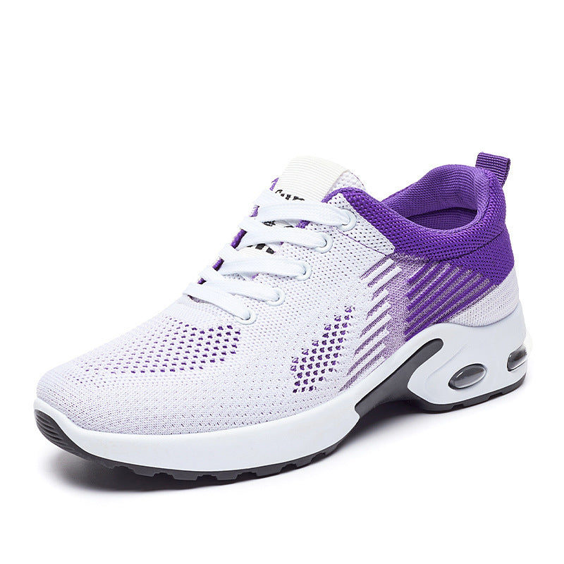 White and purple sneaker on a white background