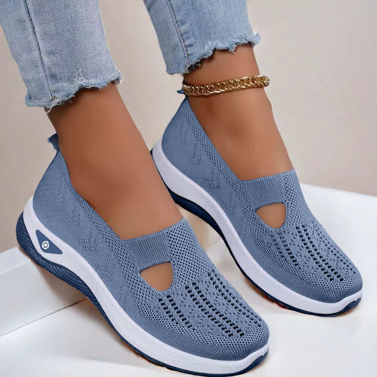 Women’s mesh flats in sky blue, breathable slip-on with cutout toe and white sole