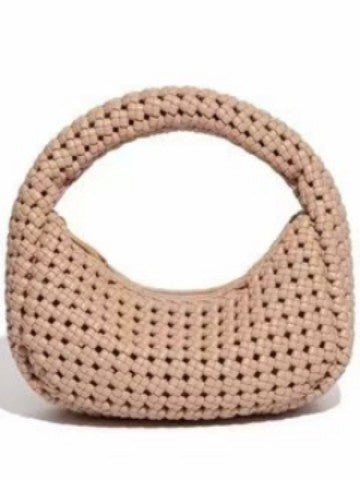 Woven handbag on a white background