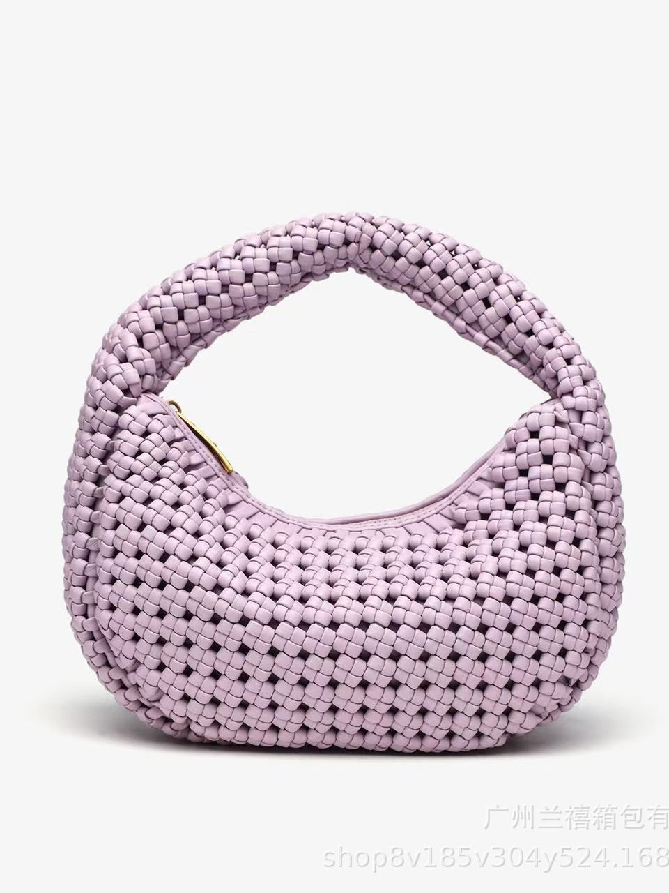 Purple woven handbag on a white background
