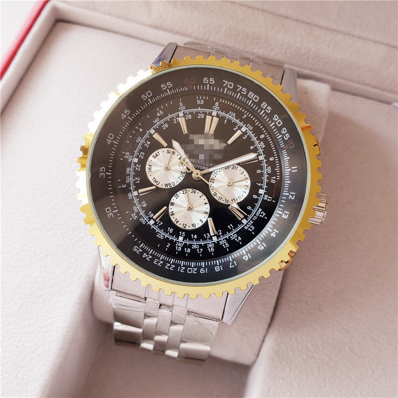 Luxury watch with a gold bezel and silver bracelet on a beige background