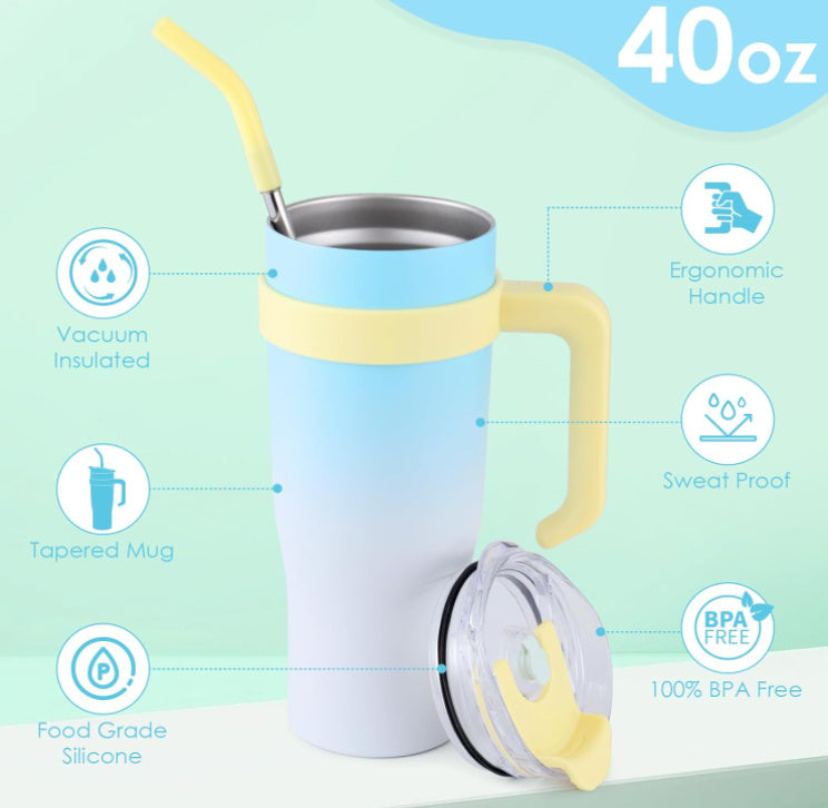 40oz insulated tumbler with handle and straw on a light green background