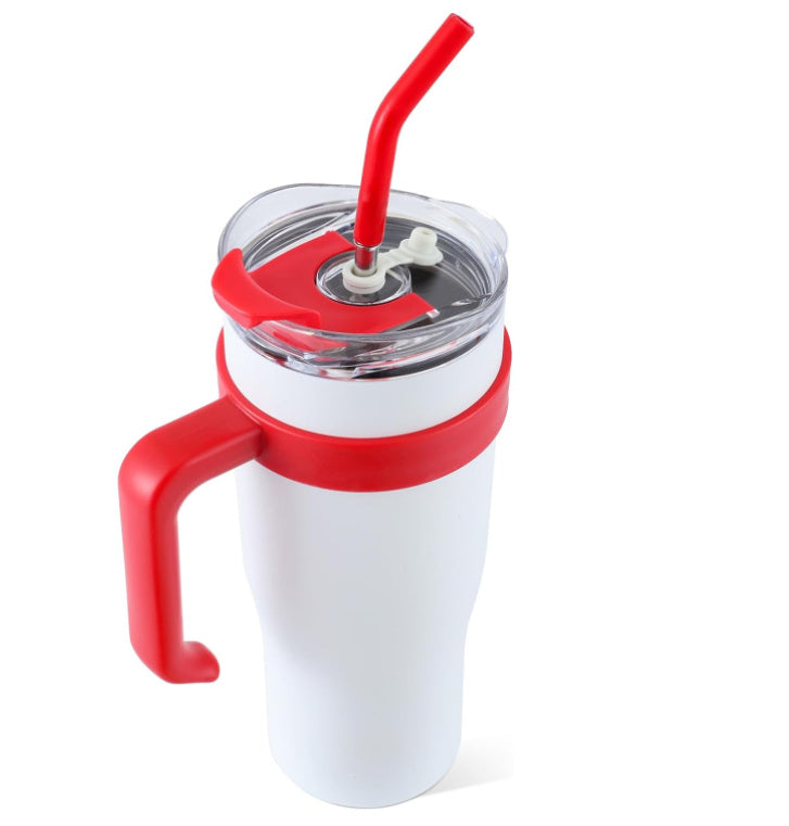 White tumbler with red handle and straw on a white background