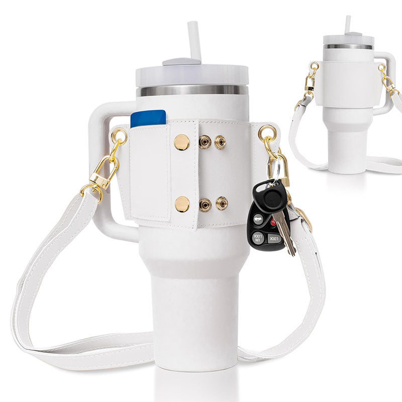 White insulated tumbler with a holder, keychain, and strap on a white background