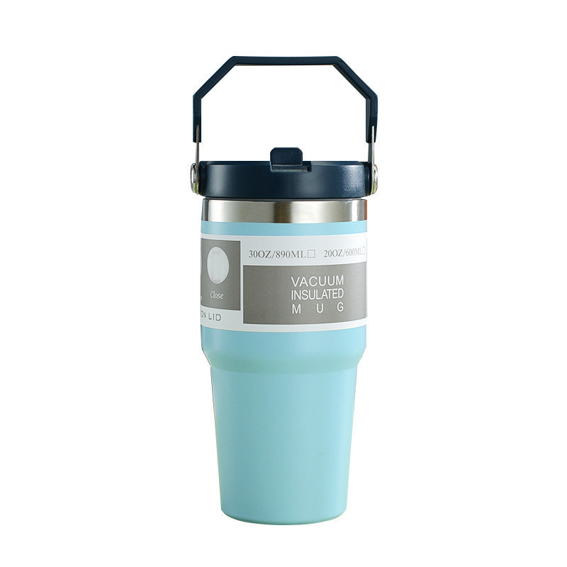 Vacuum insulated mug with handle on a white background