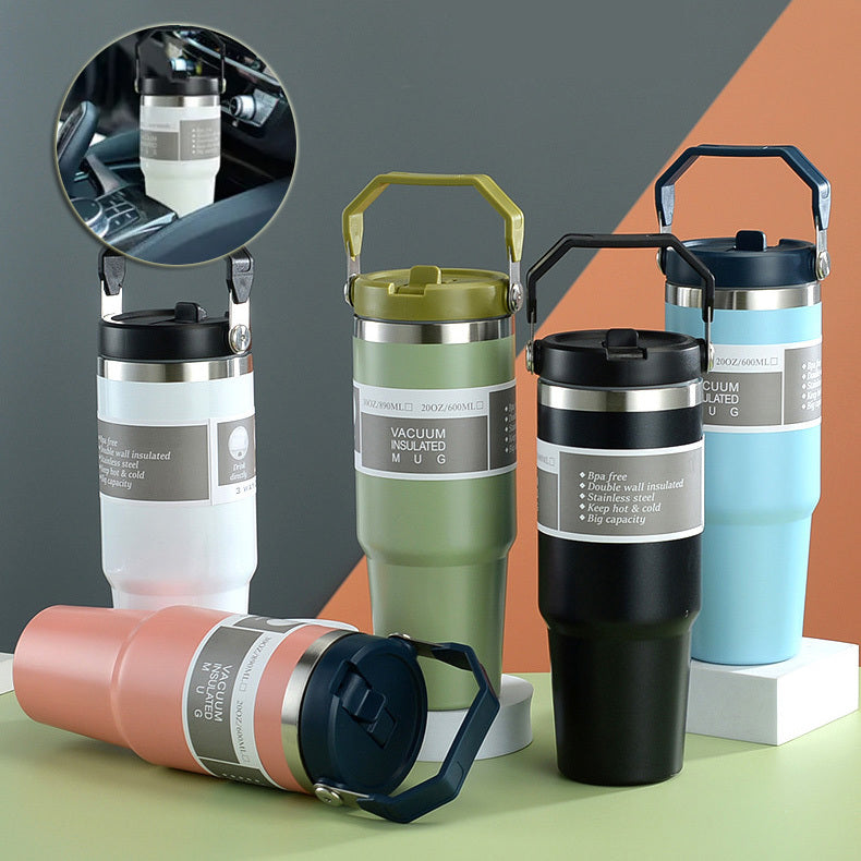 Collection of insulated travel mugs in various colors on a colorful background