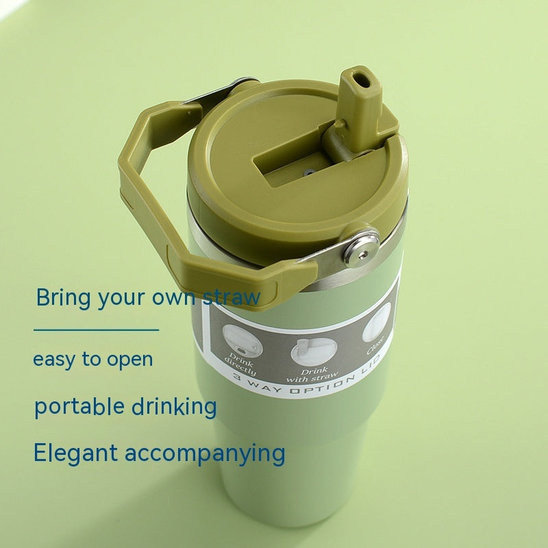 Green drinking container with straw holder on a green background