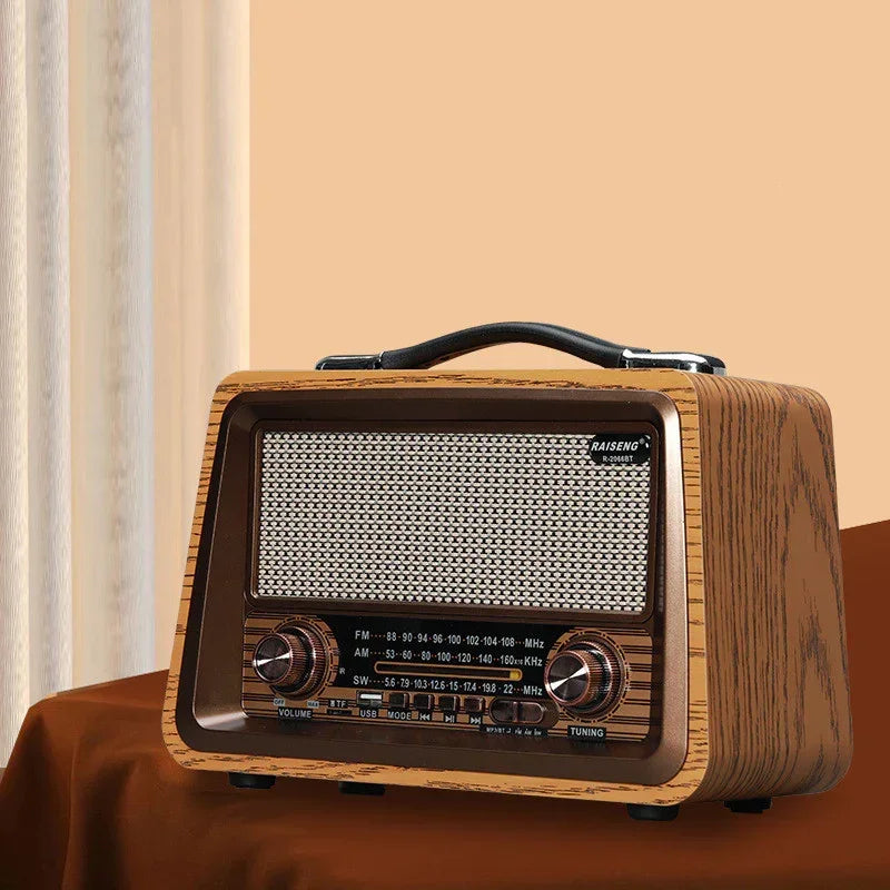 Vintage wooden Bluetooth radio with speaker grille, volume/mode dials, and black carry handle