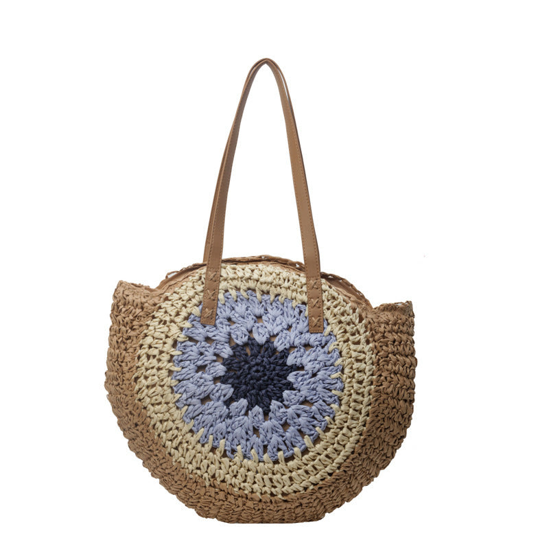 Round woven bag with a blue circular design on a white background
