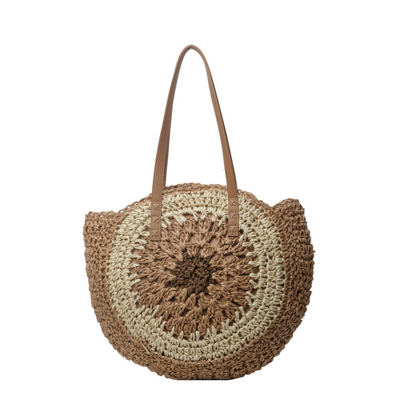 Round woven bag with a handle on a white background