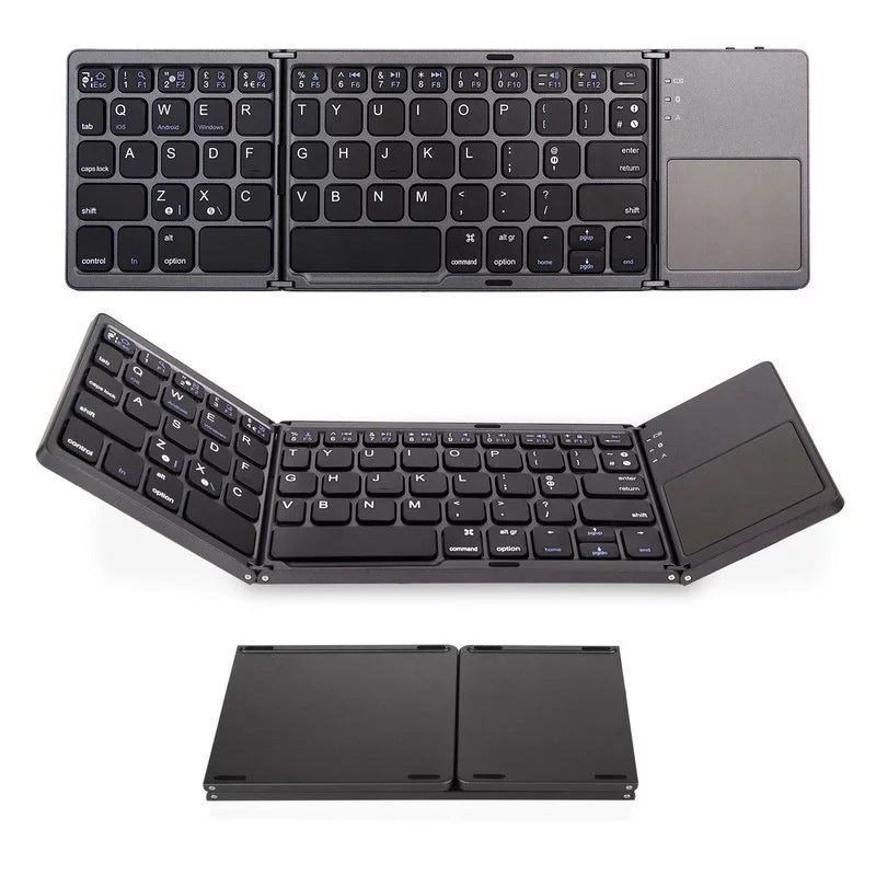 Foldable Bluetooth keyboard with trackpad on a dark projection device, open and closed