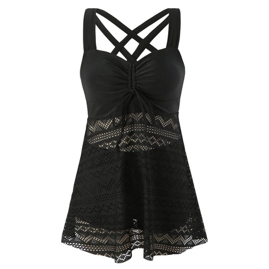 Black lace tank top with criss-cross straps on a white background