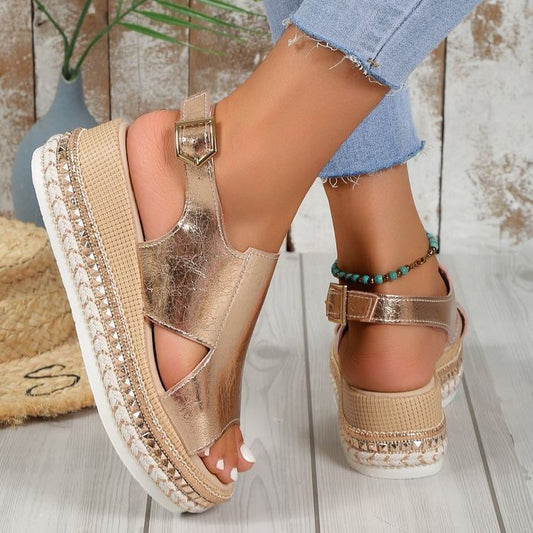 Women's Gold espadrille sandals worn with denim jeans. YAXSO STORE UAE