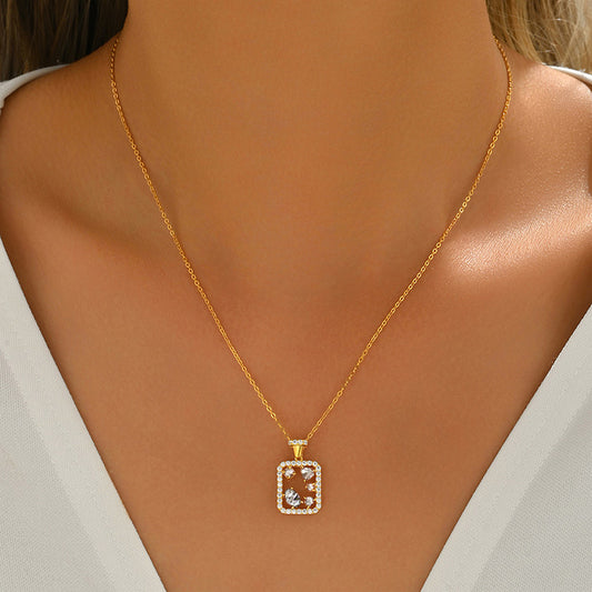 S925 sterling silver geometric rectangle necklace featuring mixed-cut D Color VVS1 moissanite stones with pave halo border in silver and gold finishes
