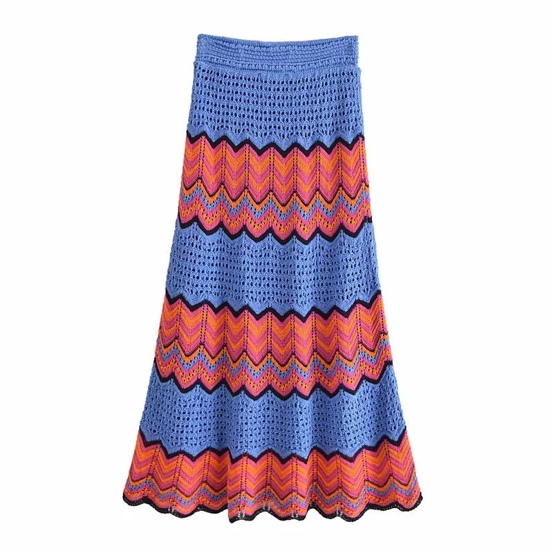 Colorful crocheted skirt with zigzag pattern on a white background
