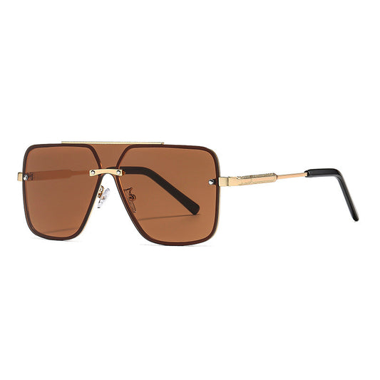 Sunglasses with gold frame and brown lenses on a white background