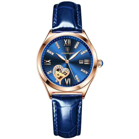 Blue watch with rose gold case and heart design on a white background