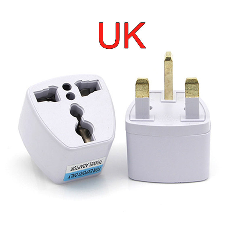 White travel adapter with UK plug design on a white background
