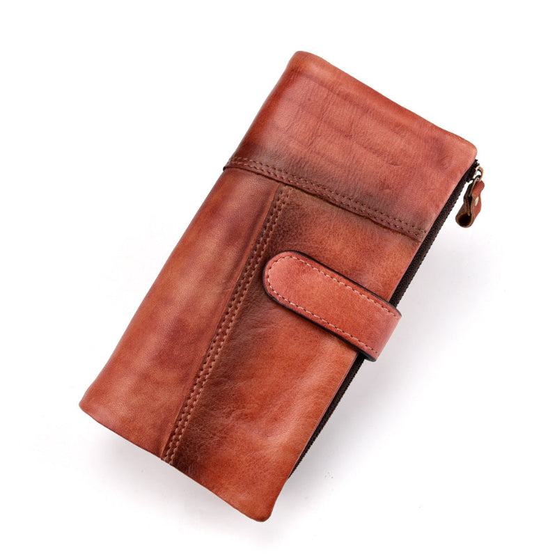 Red leather long wallet with front tab pocket and top zipper