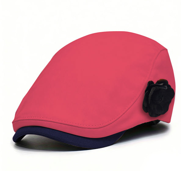 Red fabric beret with black flower accent and dark blue brim trim.