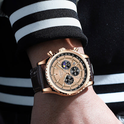Luxury watch on a wrist with a black and white striped sleeve