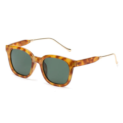 Women’s polarized sunglasses, amber tortoise frame with green tinted lenses