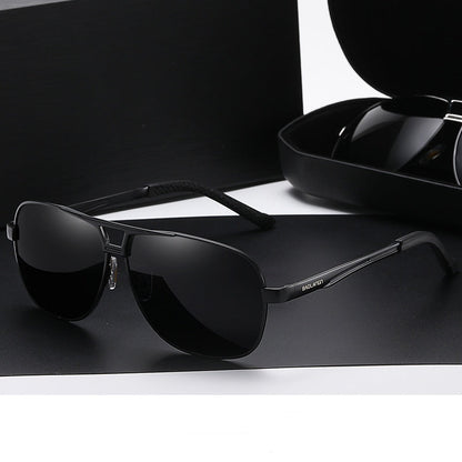 Black frame sunglasses with gray film on a black background