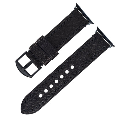 Black watch strap with metal buckle on a white background