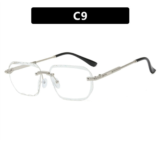 Eyeglasses with metallic frame and black temple tips on a white background