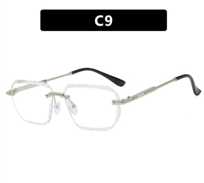 Eyeglasses with metallic frame and black temple tips on a white background