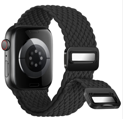 Black braided watch strap on a smartwatch with a white background