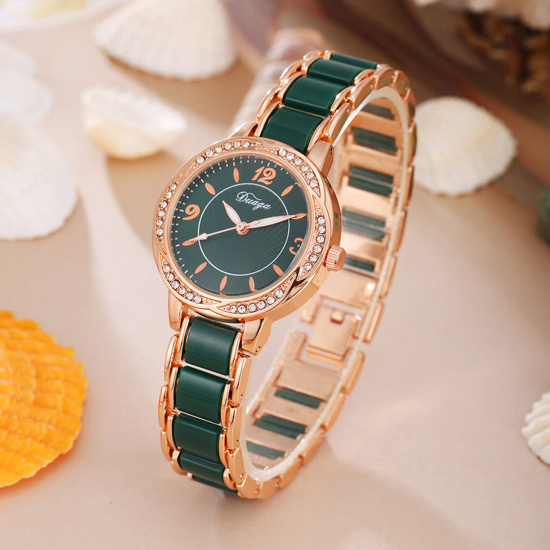 Rose gold round quartz wristwatch with green dial and green link bracelet