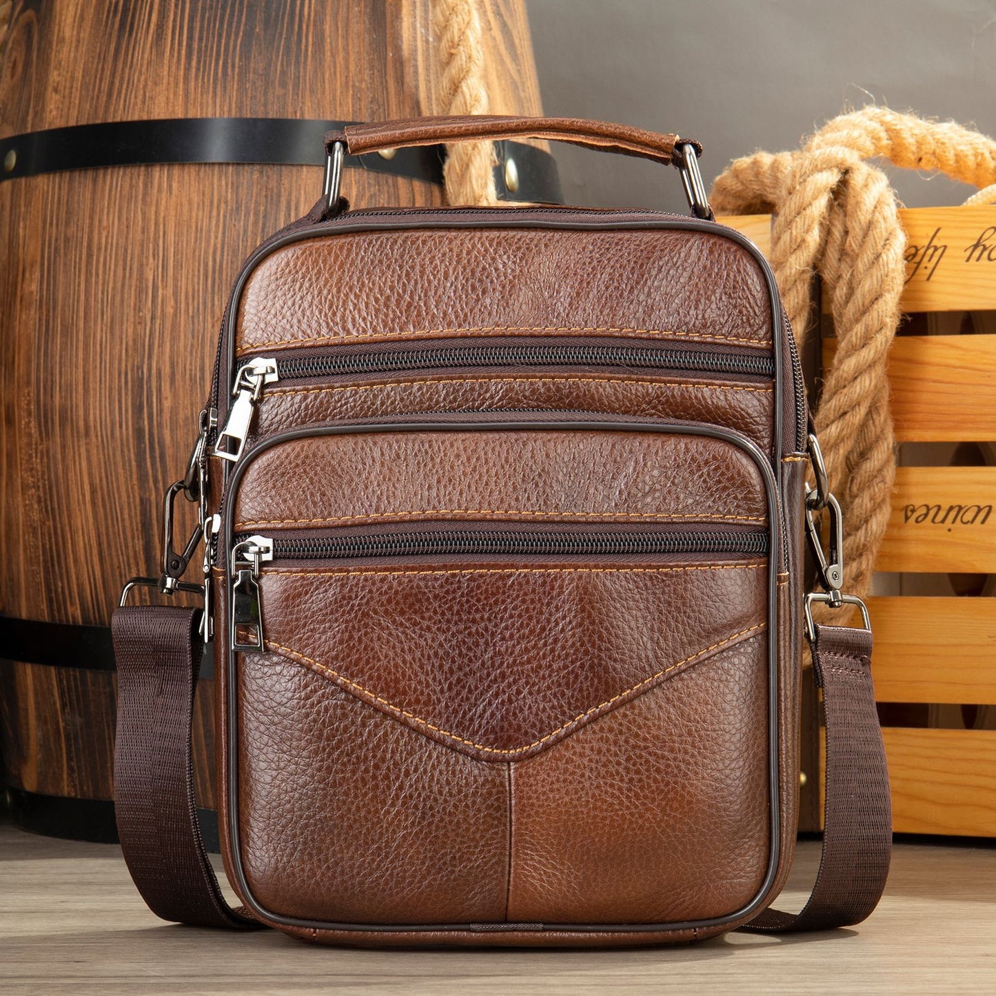 Men's genuine leather crossbody bag, medium-brown textured leather with front zip pockets